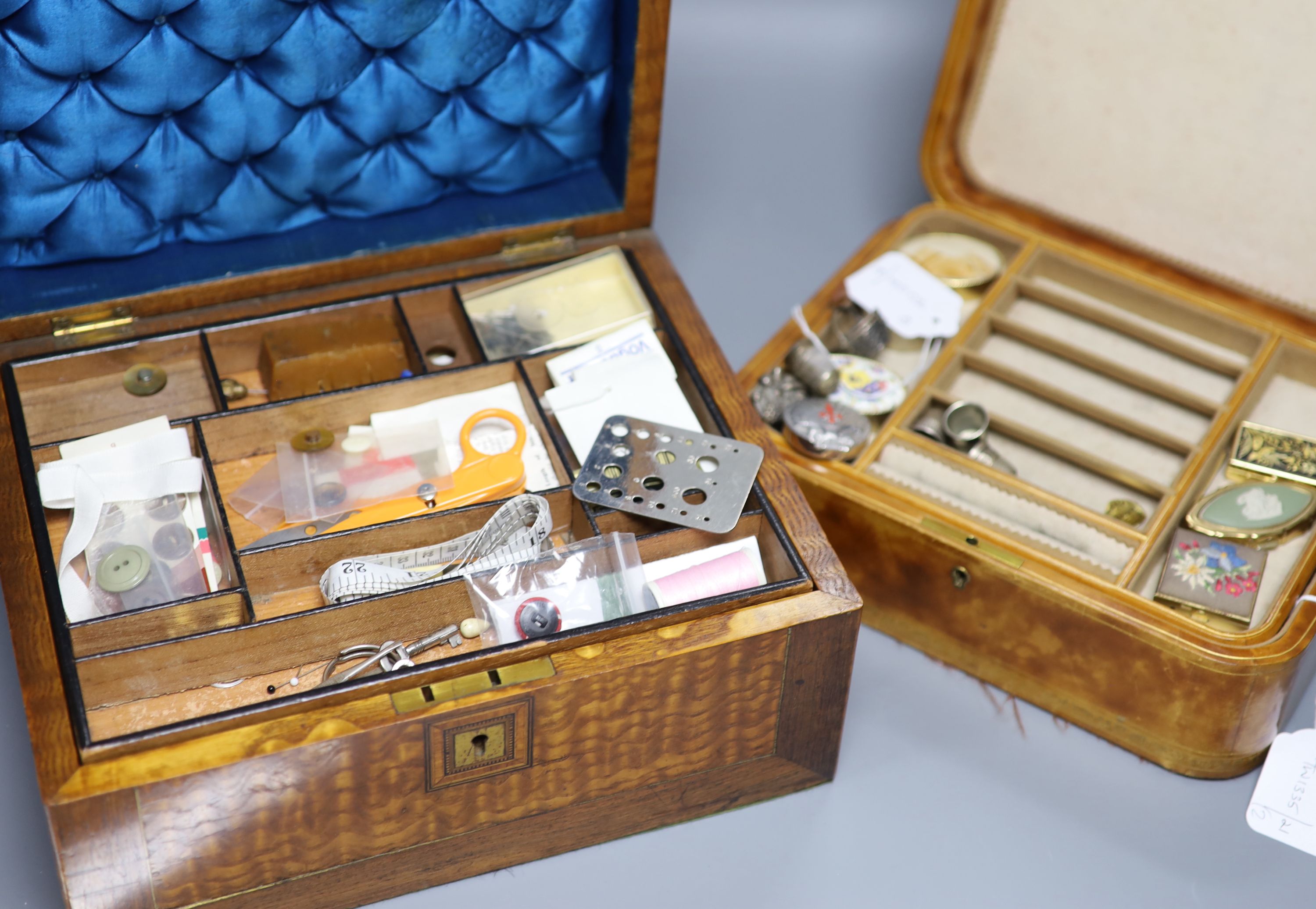 Various modern pill boxes, a pollard oak sewing box with contents, a leather jewellery case, a silver-mounted hand mirror, etc.